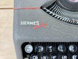 Typewriter, 1948 Hermes Baby portable