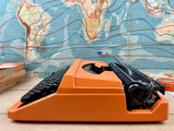 Typewriter, Orange Silver Reed 100