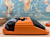 Typewriter, Orange Silver Reed 100