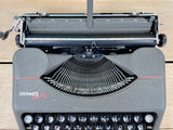 Typewriter, 1948 Hermes Baby portable