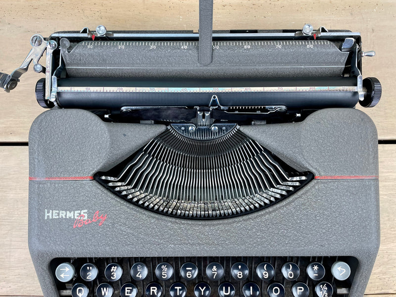 Typewriter, 1948 Hermes Baby portable