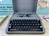 Typewriter, 1948 Hermes Baby portable