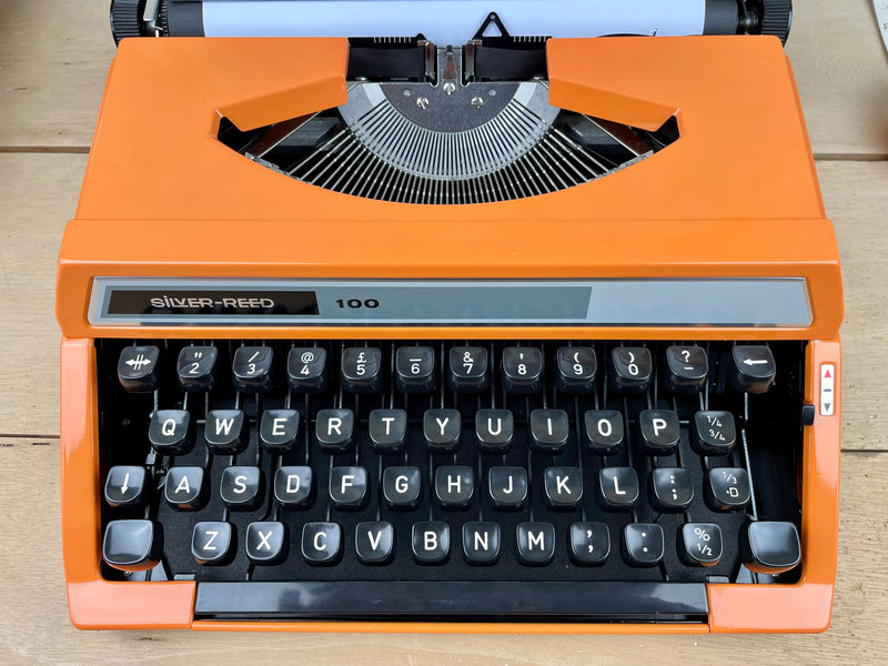 Typewriter, Orange Silver Reed 100