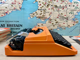 Typewriter, Orange Silver Reed 100