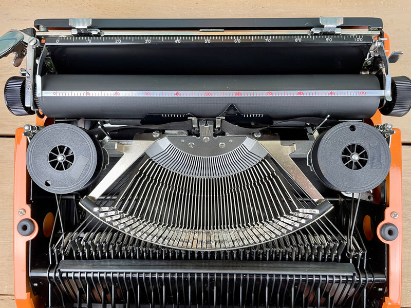 Typewriter, Orange Silver Reed 100