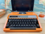 Typewriter, Orange Silver Reed 100