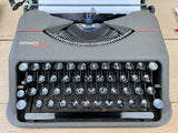 Typewriter, 1948 Hermes Baby portable