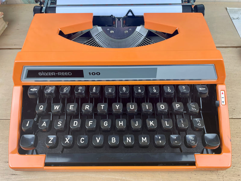 Typewriter, Orange Silver Reed 100
