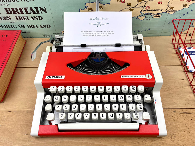 Red Olympia Traveller de Luxe Typewriter