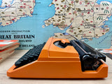 Typewriter, Orange Silver Reed 100