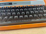 Typewriter, Orange Silver Reed 100